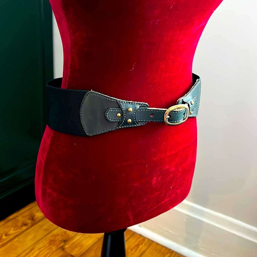 Wide elastic band belt with leather front detail and buckle